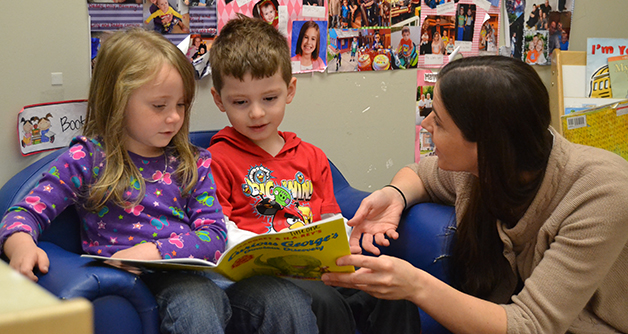 Students reading with Ms. Keyser