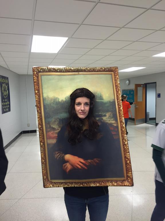 a teacher is dressed up as Mona Lisa