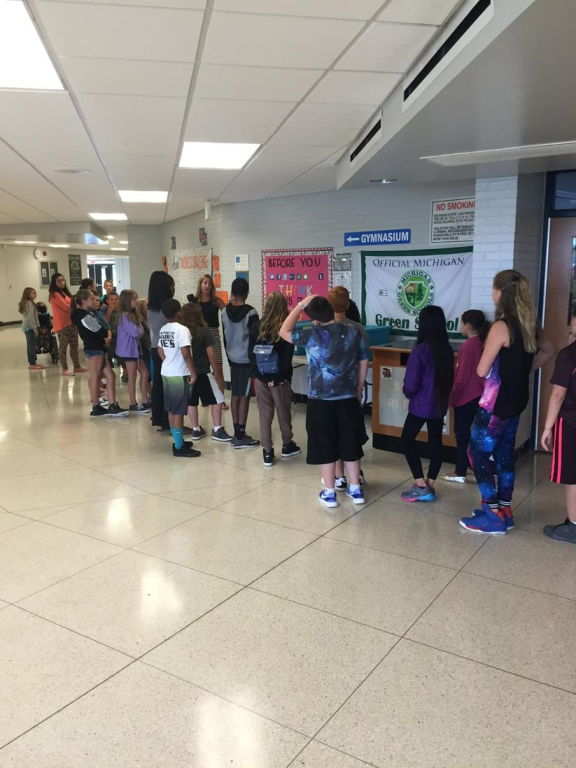 students standing in the hall way